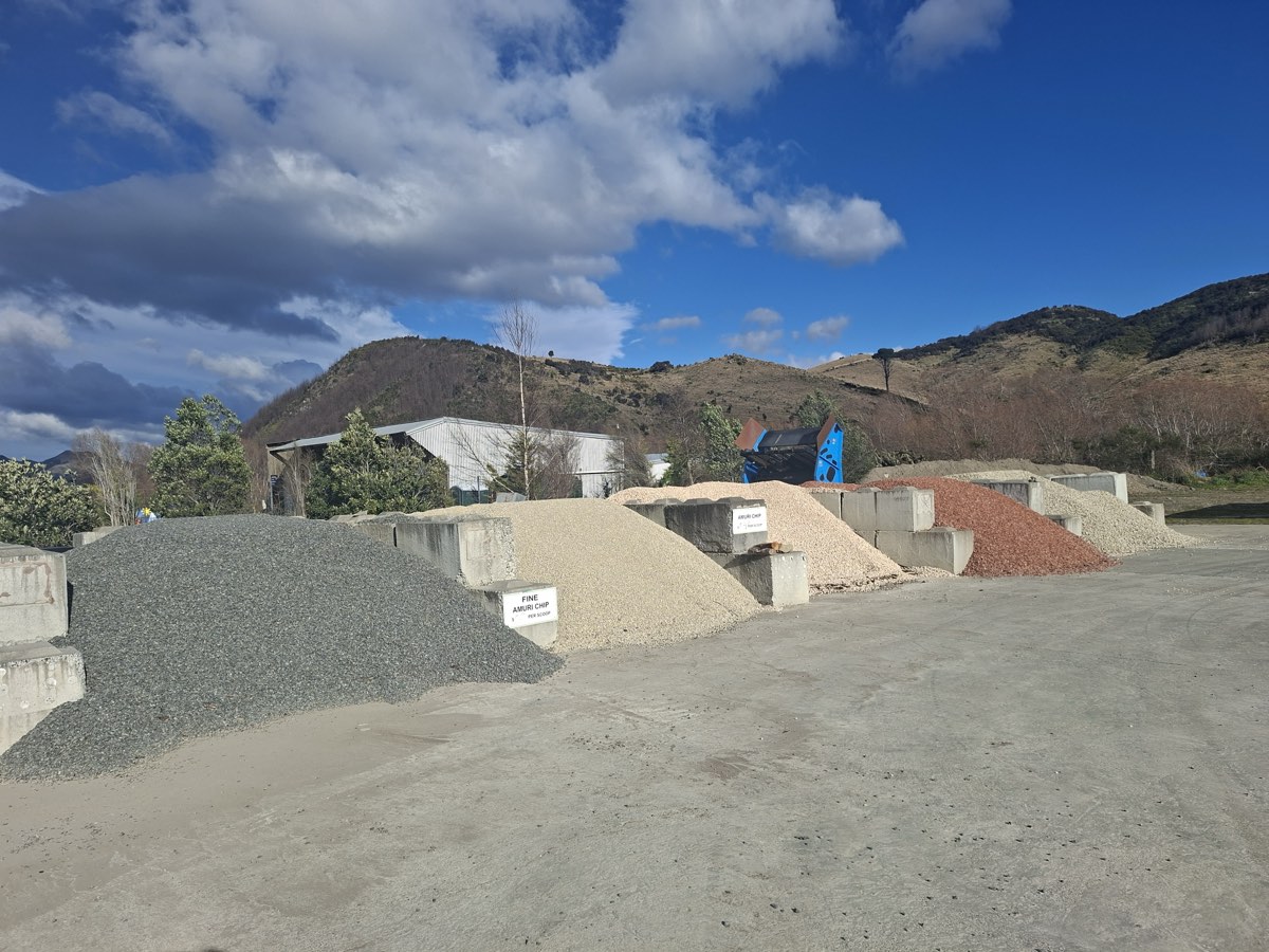 Bays of decorative chip and gravel at the Hanmer Landscape Supplies yard